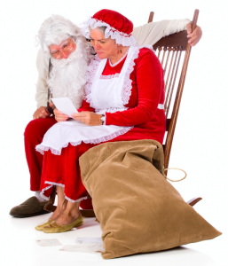 Santa and Mrs Claus reading mail